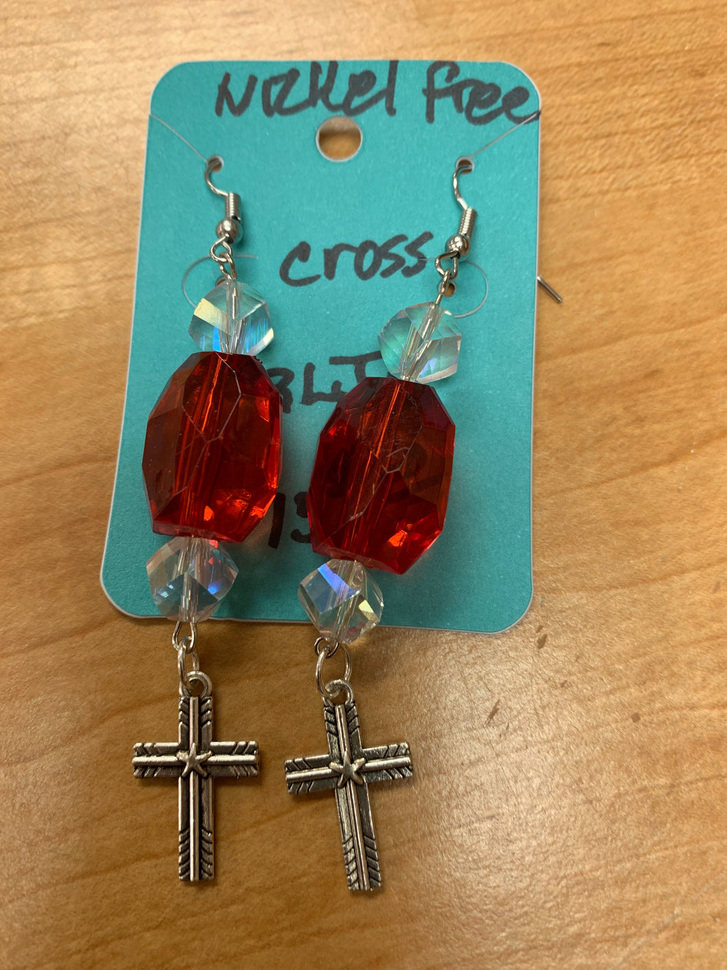 Handmade earrings,red and clear beads with pewter filagree cross